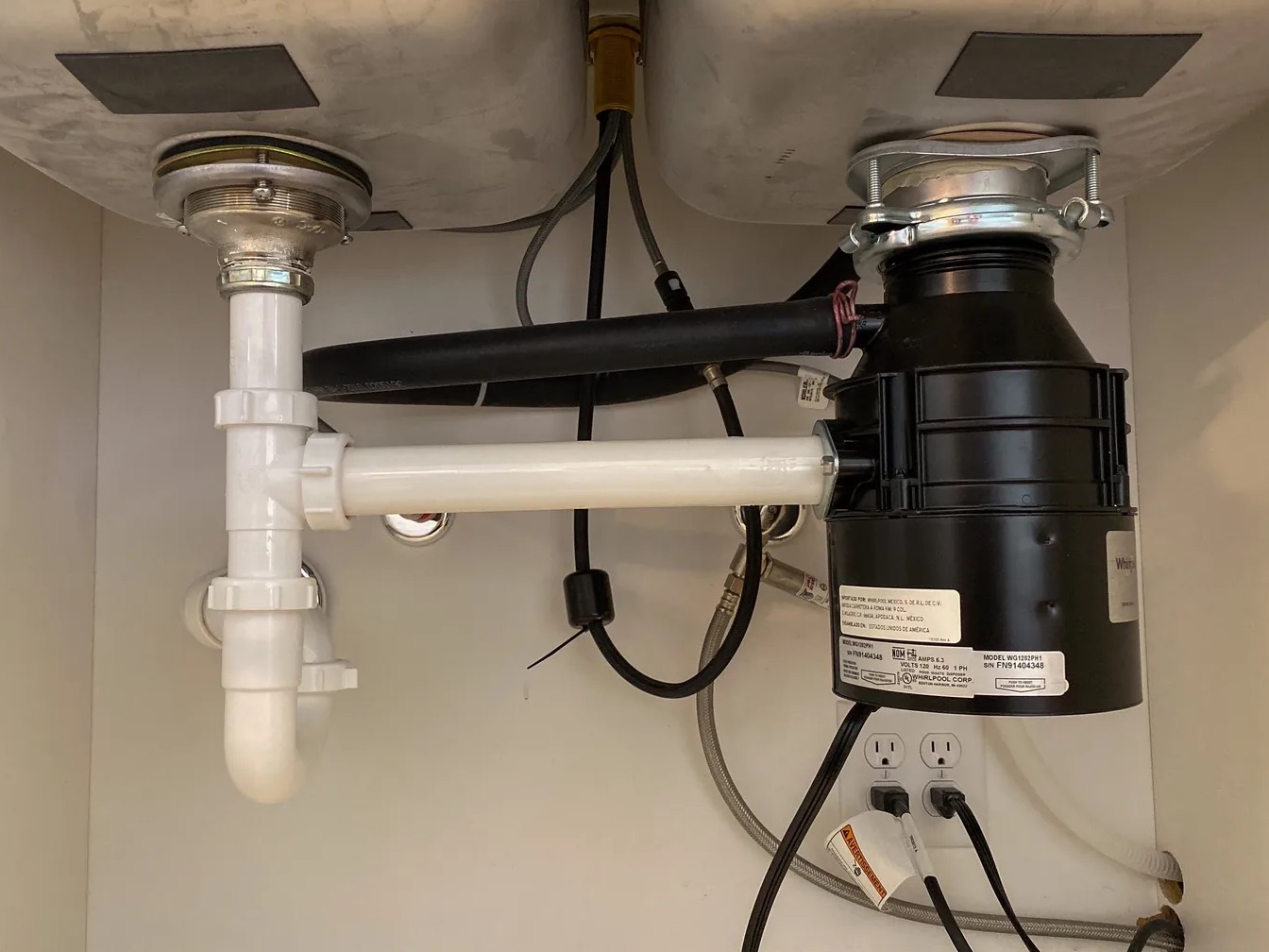 Leaky Garbage Disposal Cleanup in Coppell, TX